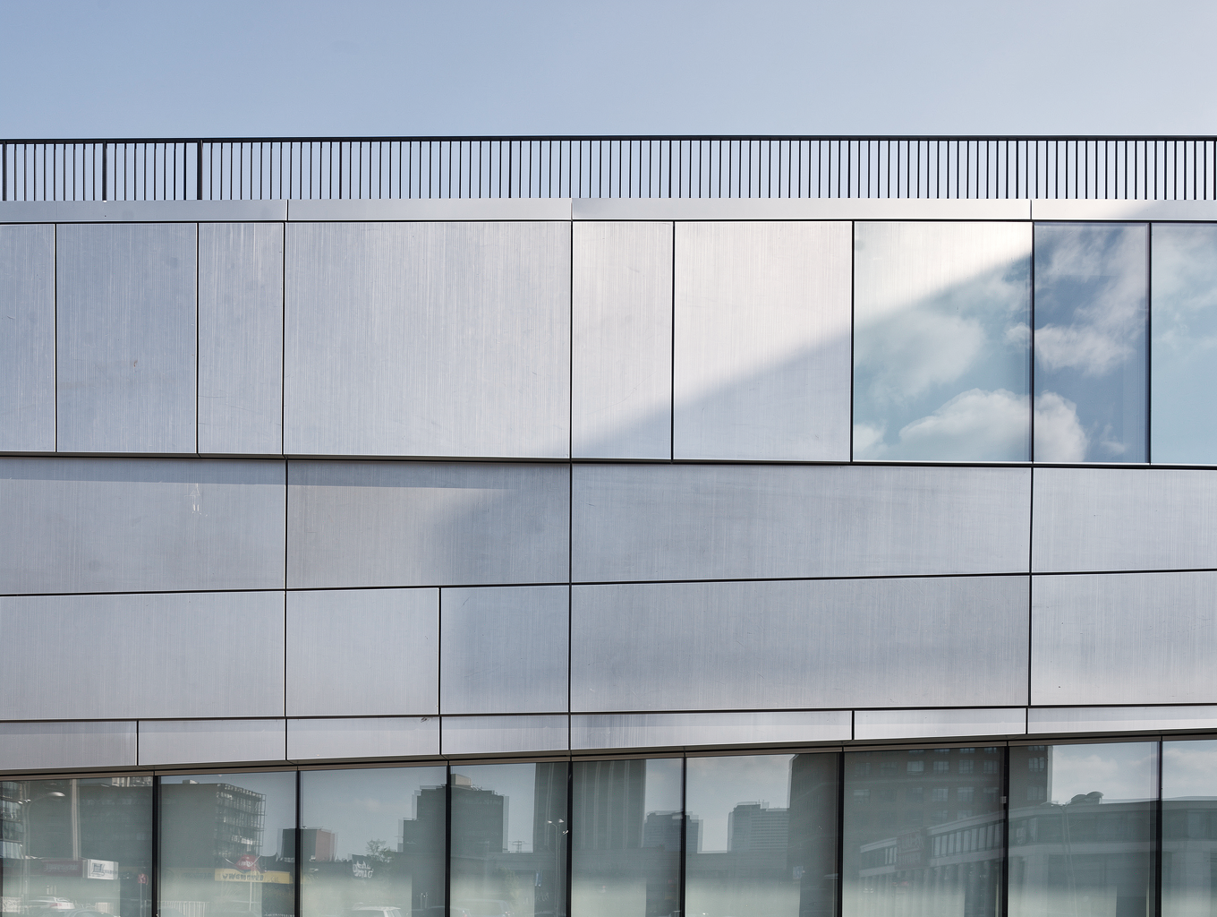 Exterior architectural shading louvers on modern building facade.