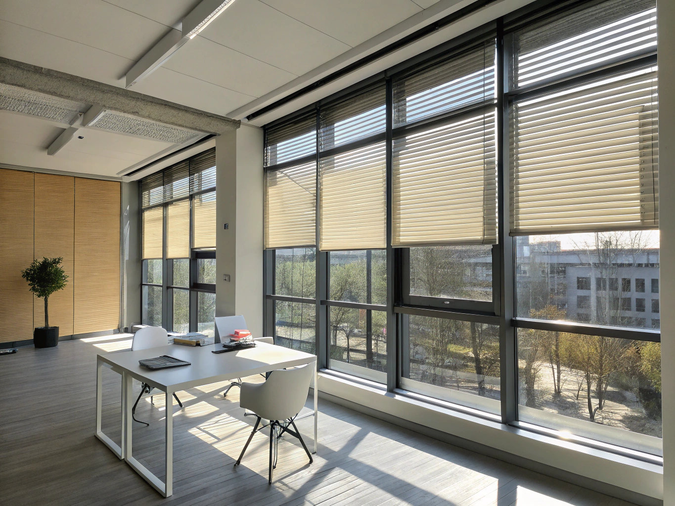 Heavy-duty vertical blinds in an office perimeter.