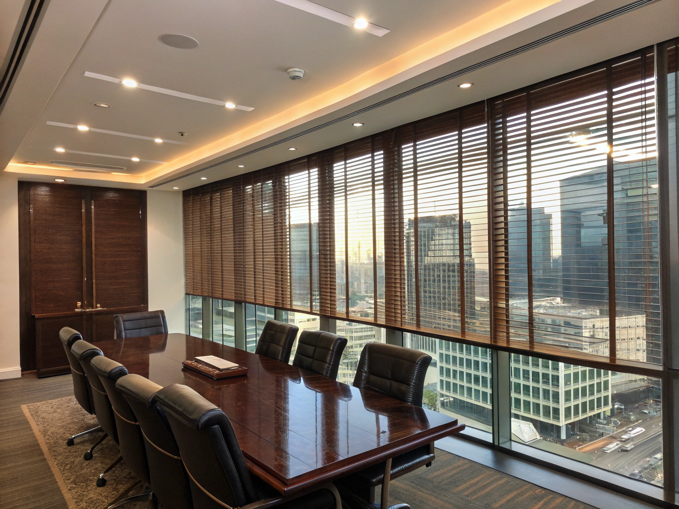 Acoustic honeycomb shades in executive meeting room.